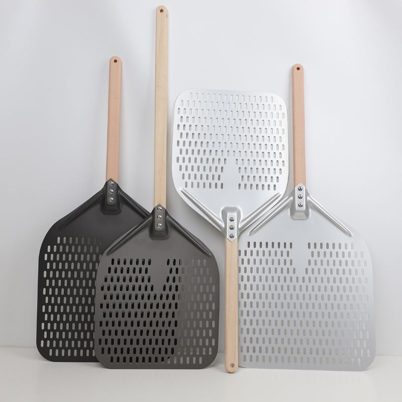 Wood handle perforated pizza shovel.JPEG